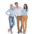 Casual team of two confident women and an attractive man Royalty Free Stock Photo