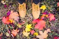 Casual unisex boots with colorful autumn fallen leaves Royalty Free Stock Photo