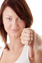 Casual woman smiling with her thumbs down Royalty Free Stock Photo