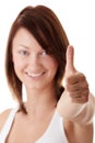 Casual woman smiling with her thumbs up Royalty Free Stock Photo