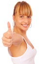 Casual woman smiling with her thumbs up Royalty Free Stock Photo