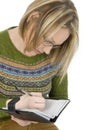 Casual Woman Writing in Datebook Royalty Free Stock Photo