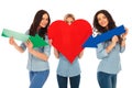 Casual women are pointing their arrows to their heart Royalty Free Stock Photo