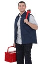 Casual worker carrying wrench Royalty Free Stock Photo