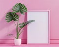 Casual workspace vibe with a frame and plant on pink, embodying modern office aesthetics , high resolution DSLR