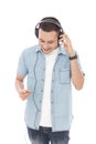 Casual young man enjoy music wearing headphones Royalty Free Stock Photo