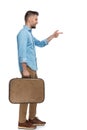 Casual young man with luggage enjoying holiday