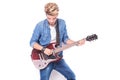 Casual young man playing his electric guitar Royalty Free Stock Photo