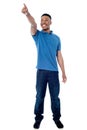 Casual young man pointing away Royalty Free Stock Photo