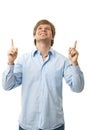 Casual young man pointing up Royalty Free Stock Photo