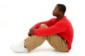 Casual Young Man Sitting On Floor Royalty Free Stock Photo