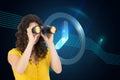 Casual young woman using binoculars Royalty Free Stock Photo
