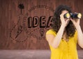 Casual young woman using binoculars Royalty Free Stock Photo