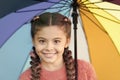 Casually beautiful. Happy childhood. Autumn snuggles. Happy little girl with colorful umbrella. Autumn fashion for cute