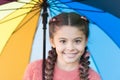 Casually beautiful. Happy childhood. Autumn snuggles. Happy little girl with colorful umbrella. Autumn fashion for cute Royalty Free Stock Photo