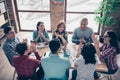 Casually dressed managers girls colleagues race brainstorming clapping approving having fun corporate wearing shirts in