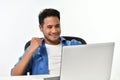 Startup business man raising his hand feeling happy for achieving work while using laptop