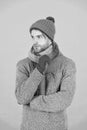 Casually handsome. Man handsome unshaven guy wear winter accessories on blue background. Winter season sale. Hipster