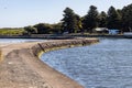 The casueway leading across to Griffiths Island Lighthouse in Port Fairy Victoria Australia on October 2nd 2023 Royalty Free Stock Photo