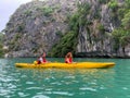 Cat Ba, Vietnam - November 19, 2019 : Caucasian couple kayaking Ha Long Bay Royalty Free Stock Photo