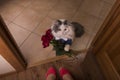 Cat brought roses as a gift to his mom