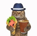 Cat with bubble waffles and coffee Royalty Free Stock Photo