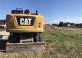 CAT caterpillar vehicle logo on the back of the digger machine