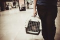 Cat closed inside pet carrier in airport Royalty Free Stock Photo