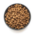 Cat and dog dry food in bowl isolated on white background. Top view Royalty Free Stock Photo