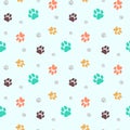 Cat and dog paw pattern. Seamless design. Colorful paws. Vector illustration. Royalty Free Stock Photo