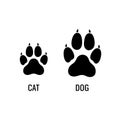 Cat and dog paw prints comparison Royalty Free Stock Photo