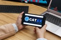 Cat.Ex Cryptocurrency Exchange Market. Female Trader Hands Holding the Smartphone Using Application. Crypto Background Concept,