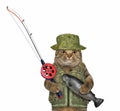 Cat with fishing rod holds caught trout 2