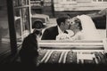 Cat gazes at a kiss of newlyweds through the window