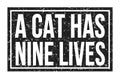 A CAT HAS NINE LIVES, words on black rectangle stamp sign