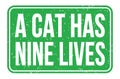 A CAT HAS NINE LIVES, words on green rectangle stamp sign