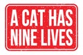 A CAT HAS NINE LIVES, words on red rectangle stamp sign