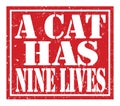 A CAT HAS NINE LIVES, text written on red stamp sign