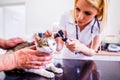 Cat during having otoscope examination at veterinary clinic.