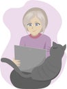 Cat-loving elderly woman doing some online shopping Royalty Free Stock Photo