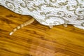 Cat paw peeking under the bed