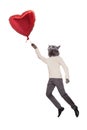 Cat people flying holding a balloon in the shape o