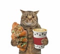 Cat with pistachio croissant and coffee