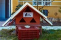 The cat`s house. Cats are adored domestic mammals. A man-made house with a table for cats and kittens