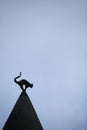 Cat sculpture on roof