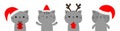 Cat set holding gift box, xmas ball. Merry Christmas. Cartoon kawaii character. Cute face icon. Red santa hat, deer horns. Kitten Royalty Free Stock Photo