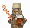 Cat with beer and shrimp skewer Royalty Free Stock Photo