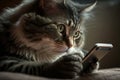 A cat on a table playing with a cell phone, AI Generated Royalty Free Stock Photo