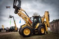 Cat tractors and other construction equipment at the public event of Riga Machinery Sales. Royalty Free Stock Photo