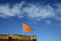 Catalan flag fluttering in the wind in Montjuic Castle. BARCELONA, CATALONIA, SPAIN Royalty Free Stock Photo